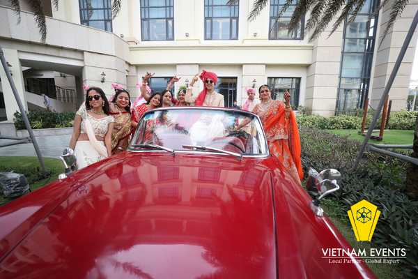 Groom and guests in the Baraat took photos together